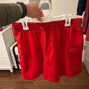 red shorts